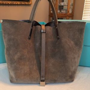 Suede and metallic reversible purse
